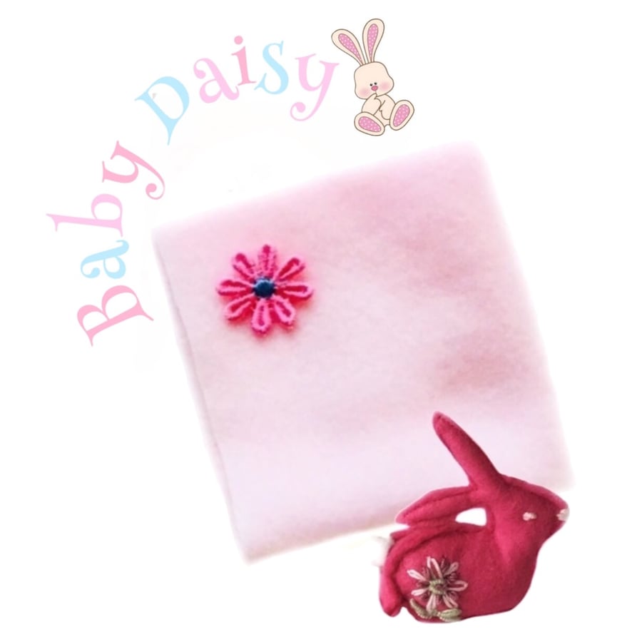 Baby Daisy Blanket and pink rabbit toy