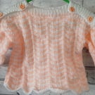 Hand-knitted baby jumper.  Approx 3 to 6 months. Price includes P and P. 