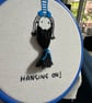 Embroidery hoop with motivational quote of a girl “hanging on” upside down  - Image 2