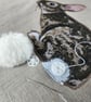 Handmade taupe-grey linen cushion with sewn printed rabbit & fluffy pompom tails - Image 6
