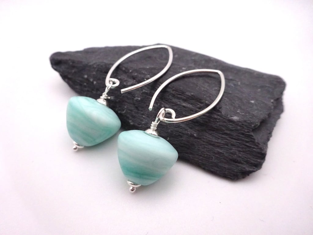 lampwork glass pale green cone earrings