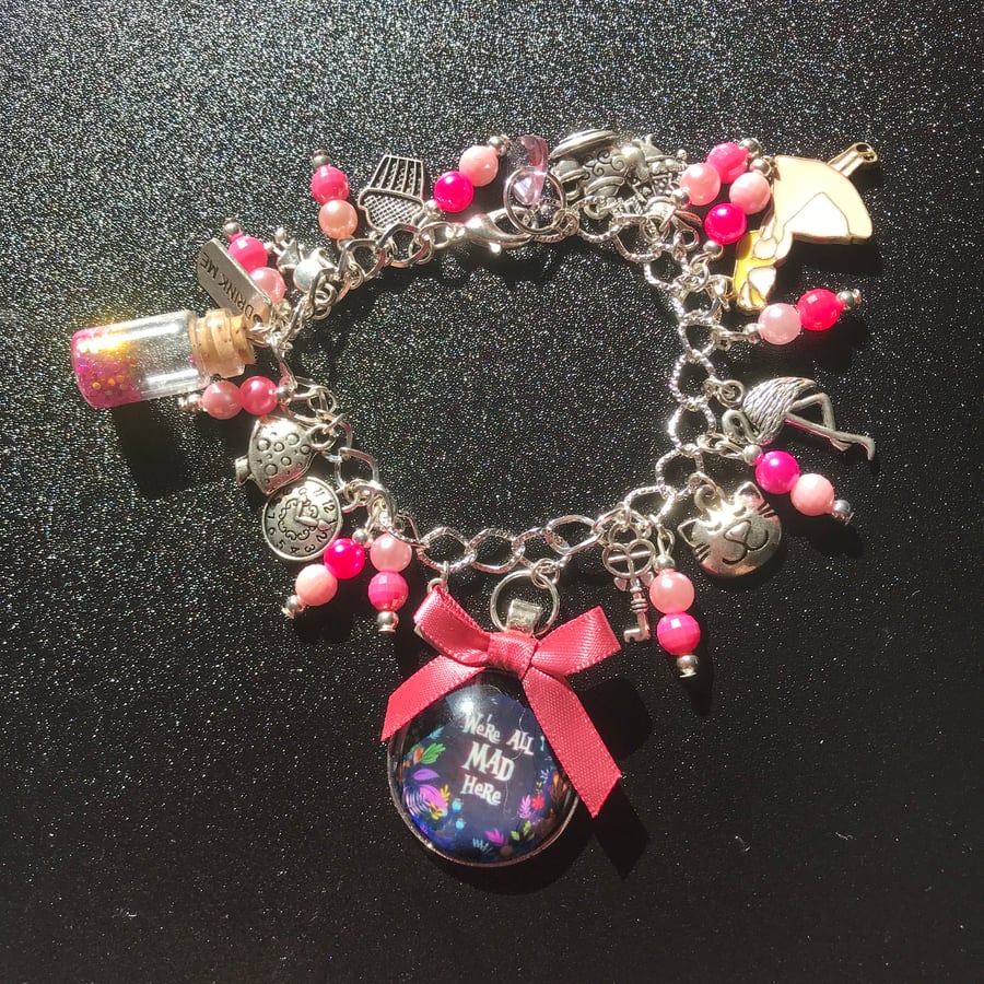 Pink Alice in wonderland theme bracelet