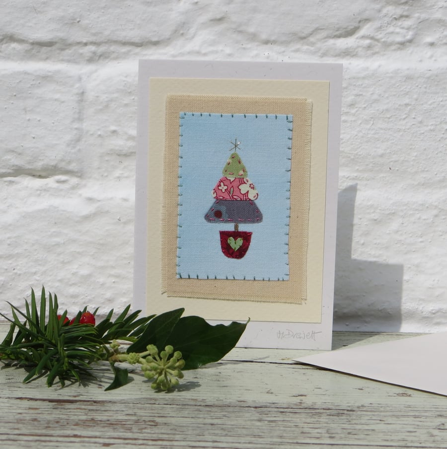 Little Tree, hand-stitched miniature textile on card with gold star at the top