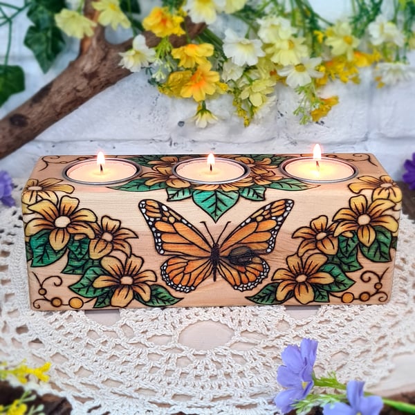 Triple butterfly candle holder