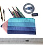 Crayon shaped pencil case.