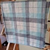 Pale blue checked wool fabric
