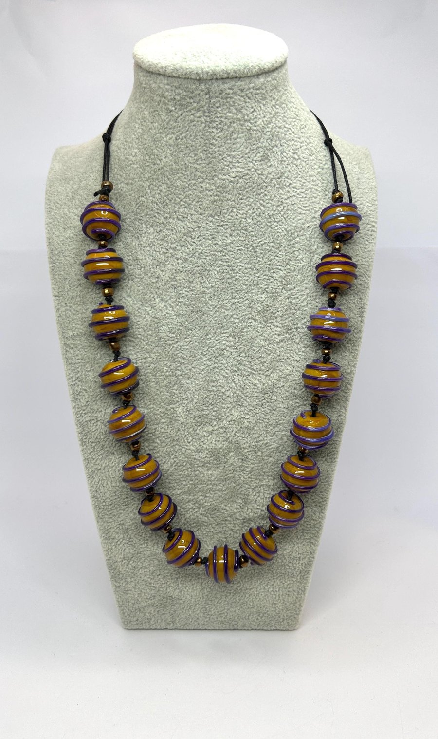 Handmade necklace with handmade brown and purple lampwork glass beads