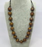 Handmade necklace with handmade brown and purple lampwork glass beads - Image 1