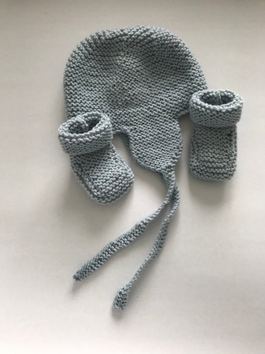 Hand knitted baby hat and bootees
