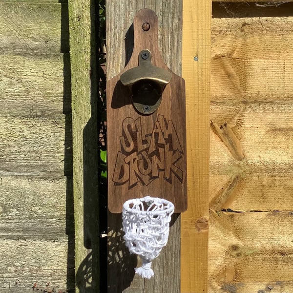 Wall mounted bottle opener with basketball net cap catcher (slam drunk)