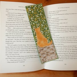 Bookmark ginger cat looking into the meadow