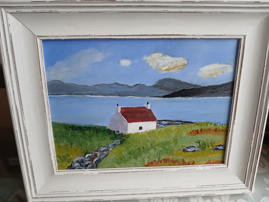 Cottage in Scotland with Red Roof looking over to mountains