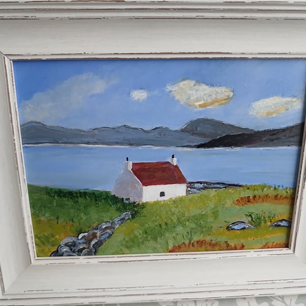 Cottage in Scotland with Red Roof looking over to mountains