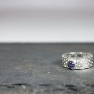 Made by Hand Silver Ring with Lacy Drilled Hole Pattern and 5mm Violet Iolite 