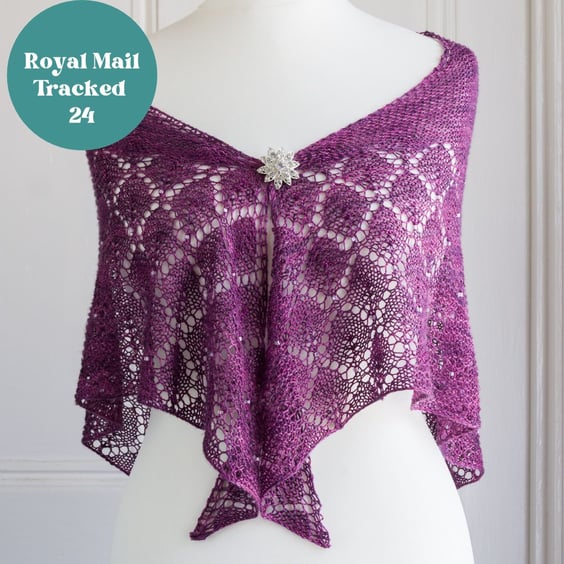 Lace shawl, hand knit in mulberry silk in a triangular shape