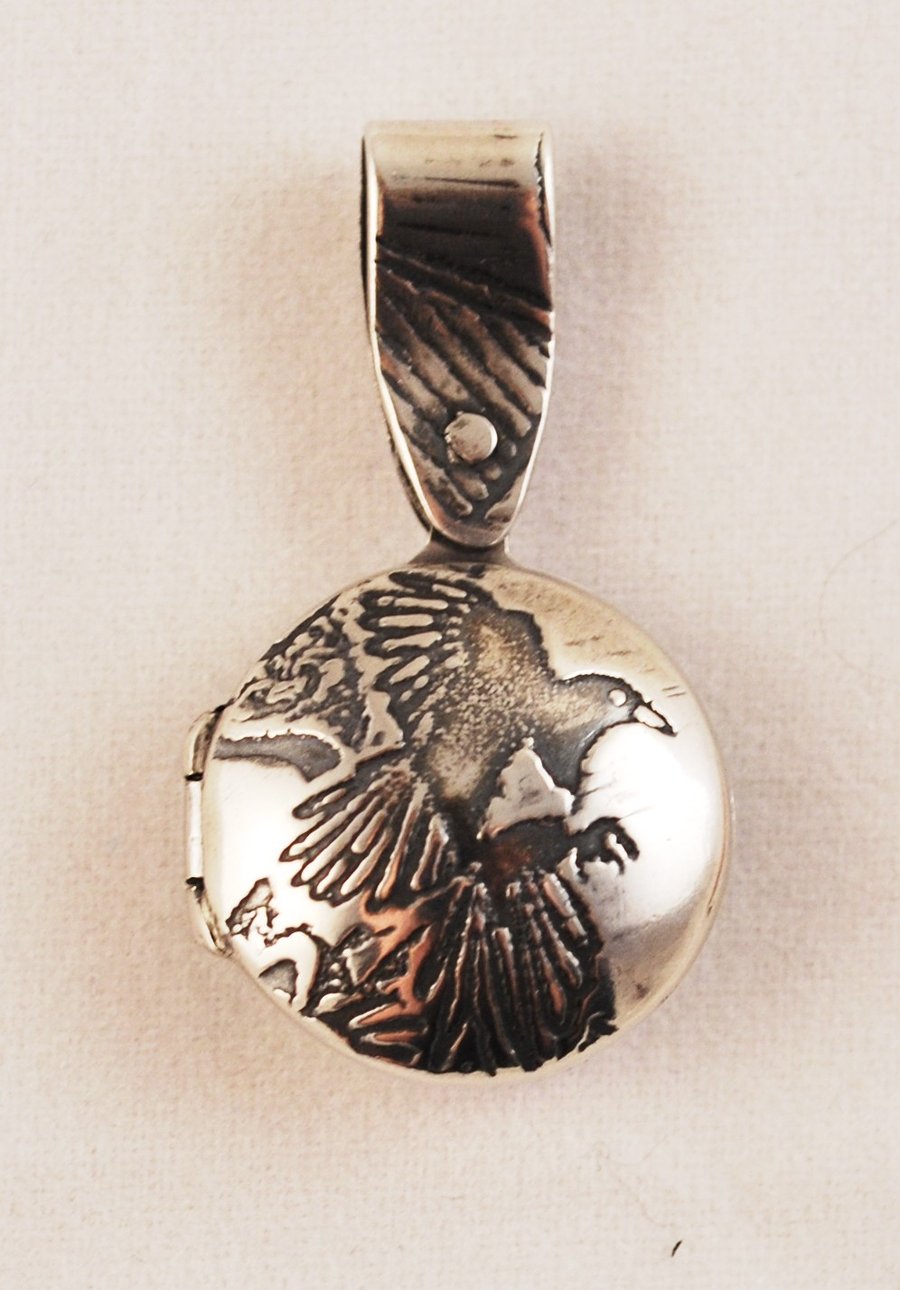 small sterling silver magpie locket