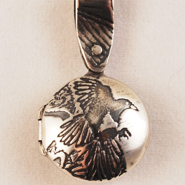 small sterling silver magpie locket