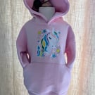 Hooded sweatshirt with machine embroidered pattern