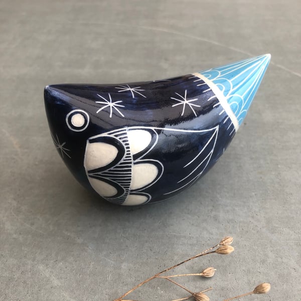 Large dark blue and turquoise  ceramic bird .