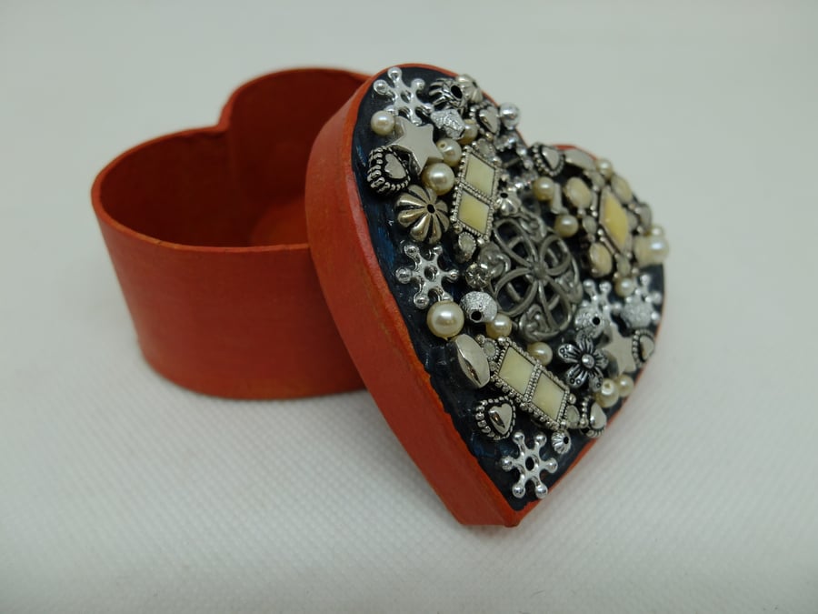 Small orange heart shaped decorated box