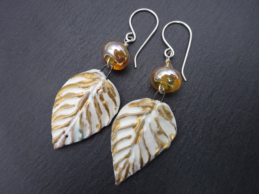 lampwork glass gold earrings, white ceramic leaf jewellery