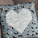 Puffin Rock Cushion with a Heart