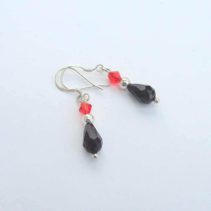 Sterling silver black and orange crystal drop earrings
