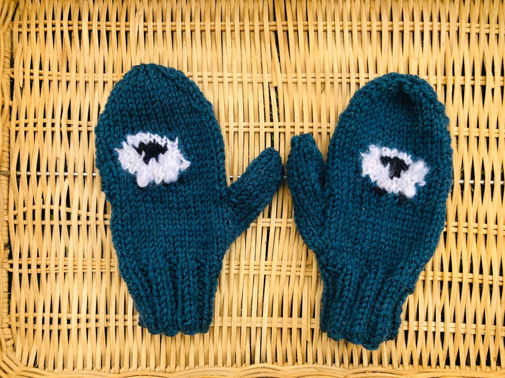 Hand knitted mittens with thumbs. Toddler ,boy ,girl with  strings. Sheep,