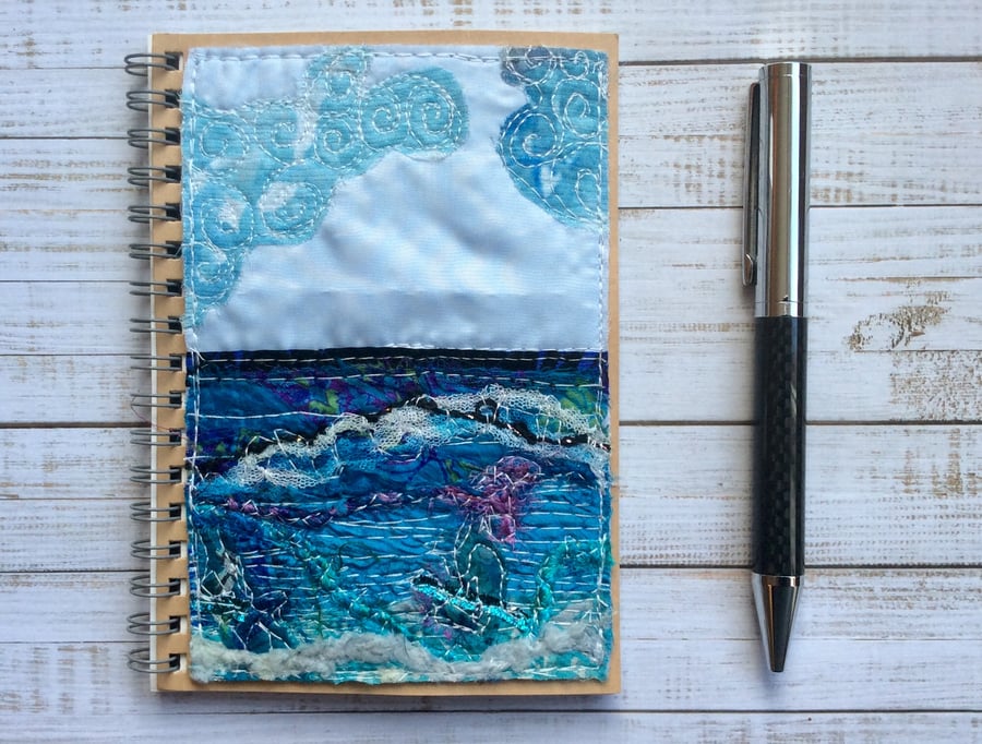 Embroidered seascape recycled A6 spiral lined notebook. 