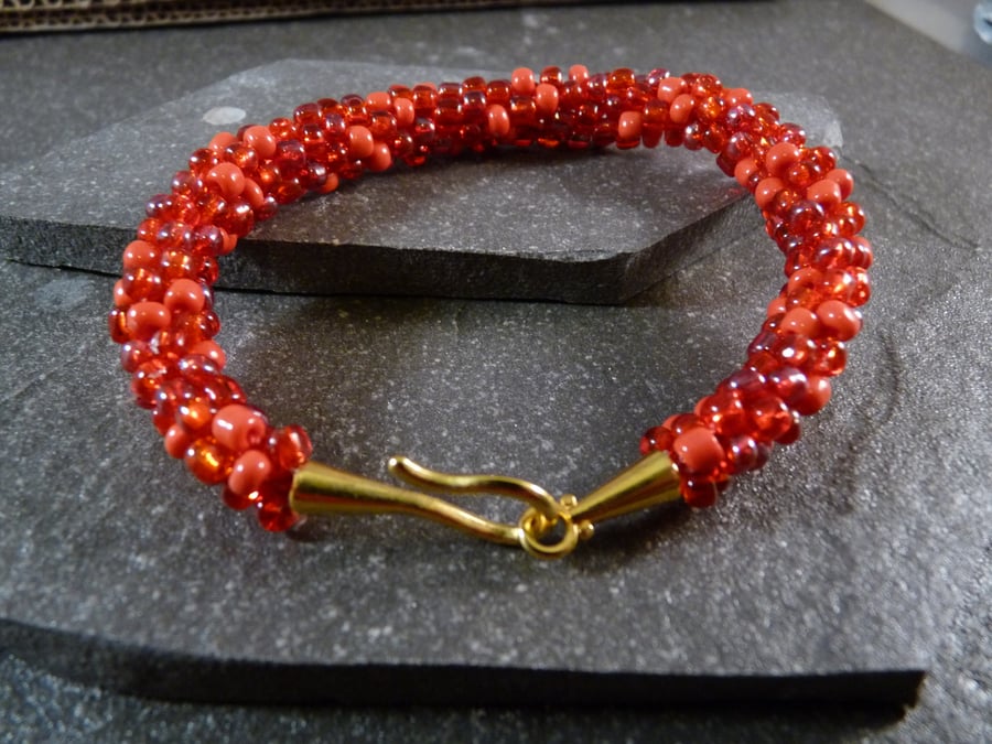 Shades of Red Kumihimo Bracelet - Yellow Gold Copper Clasp