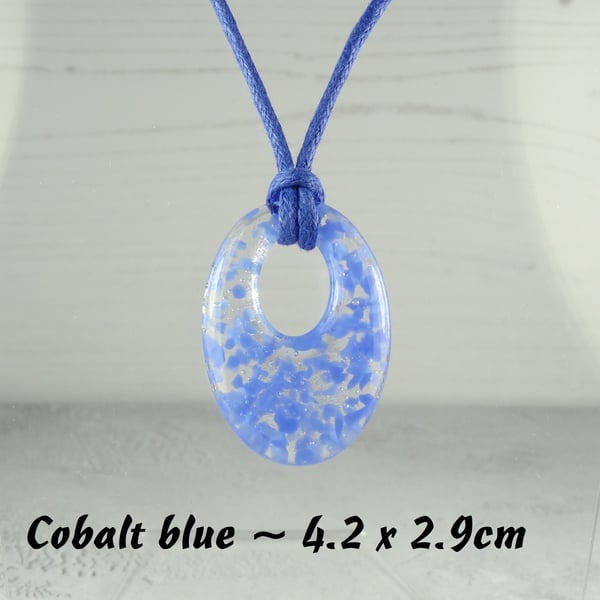 4 colours - handcrafted fused glass off-set oval pendant on a waxed cotton cord
