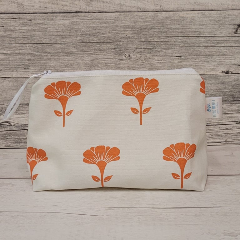Orange marigold zipped cosmetic bag