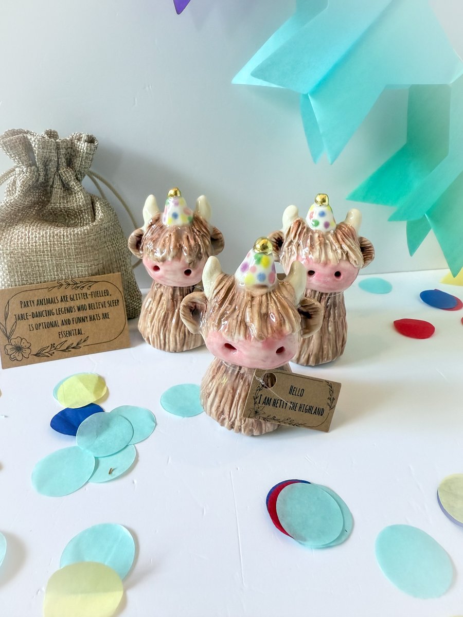 Handmade porcelain party highland cow 