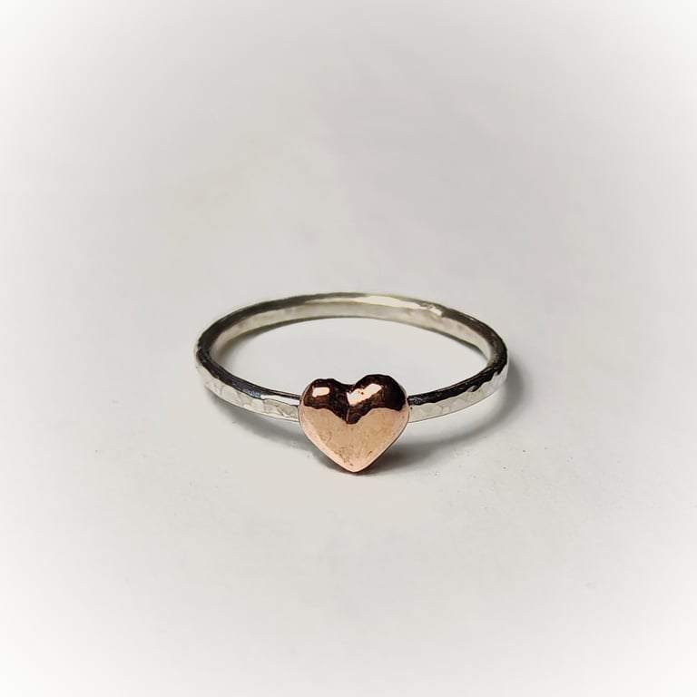 Silver ring with copper heart