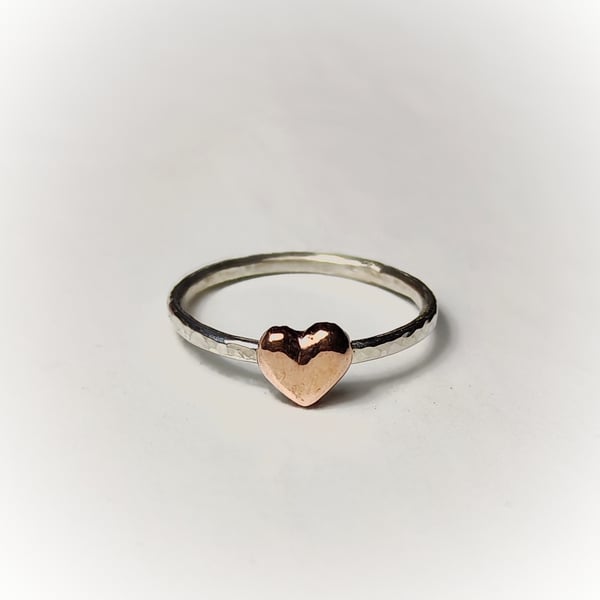 Silver ring with copper heart