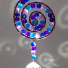 Suncatcher copper wire wrapped spiral shape with purple & blue beads
