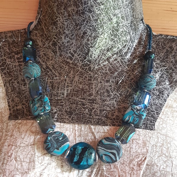  Distinctive necklace in turquoise, black and silver polymer clay