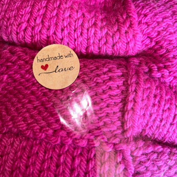 Handknitted baby blanket cerise pink