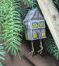 Baba Yaga's Chicken Leg Hut hand carved and painted decoration with dangly legs
