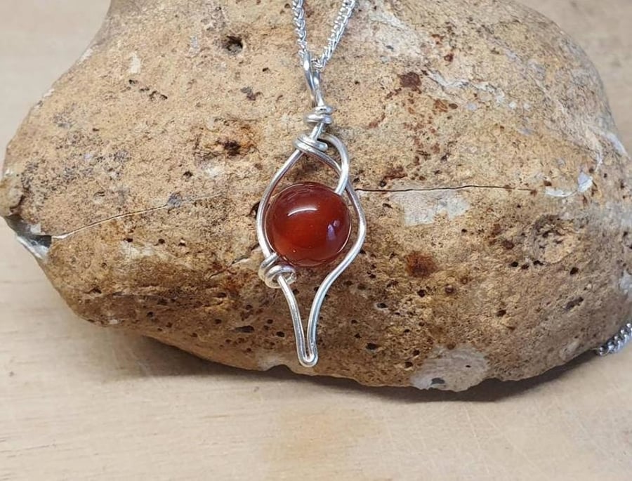 Wire leaf carnelian pendant. July birthstone
