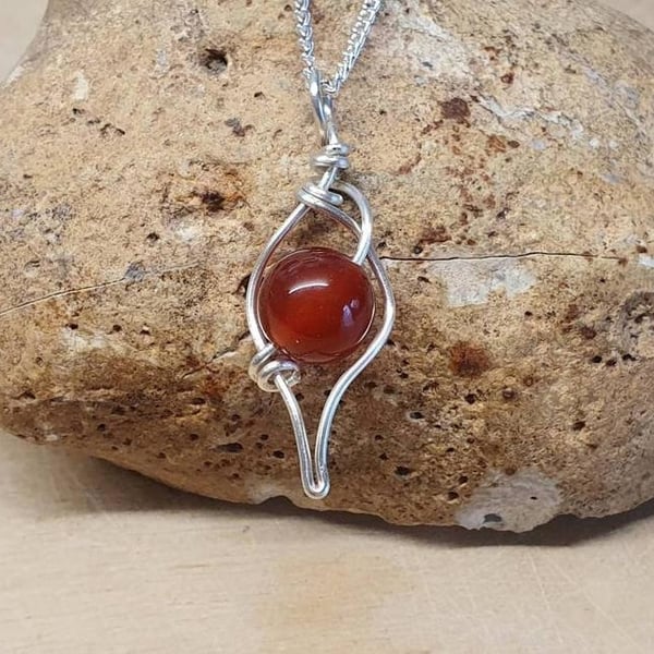 Wire leaf carnelian pendant. July birthstone