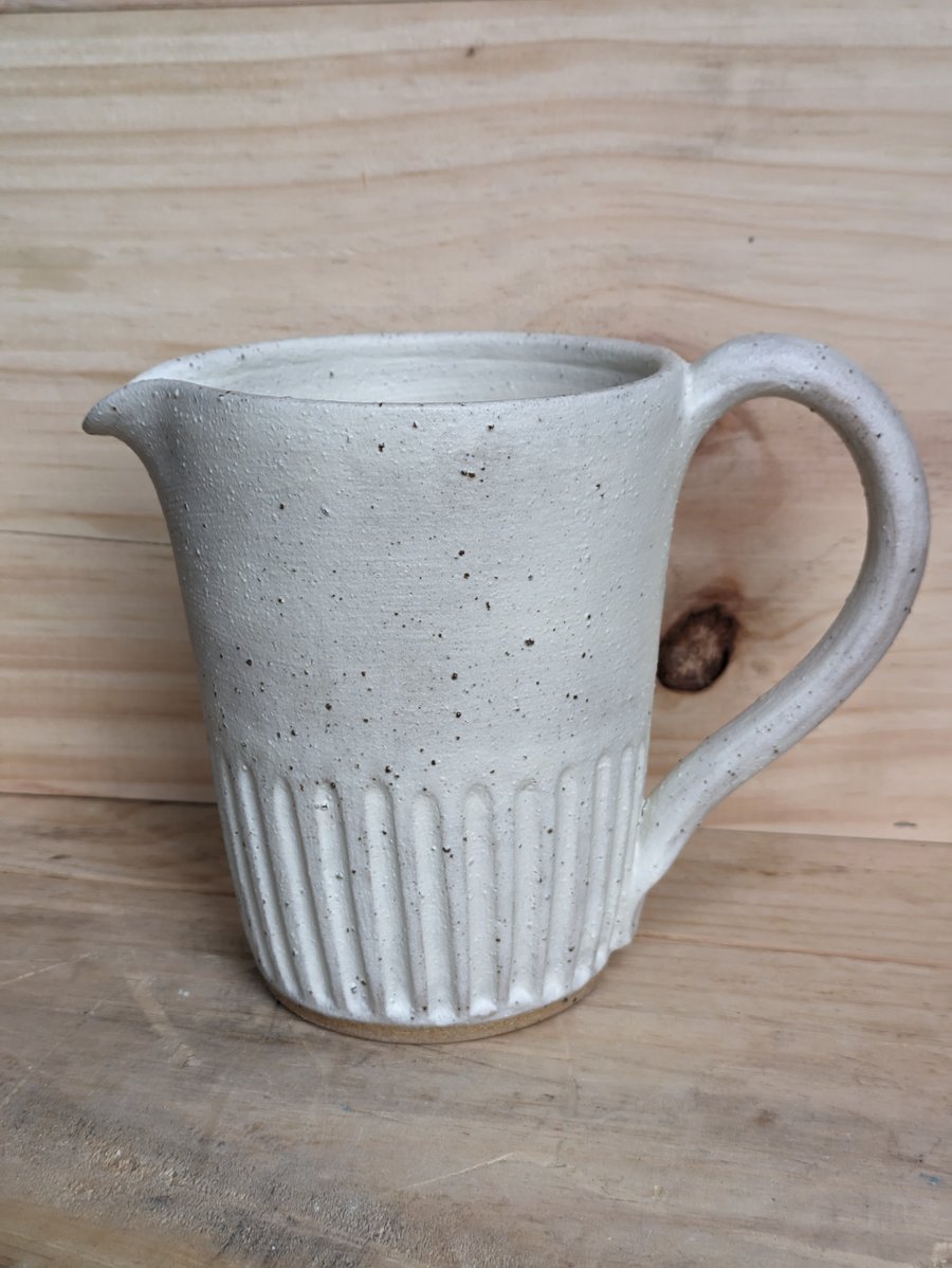 Larger matte cream carved jug (fully glazed)