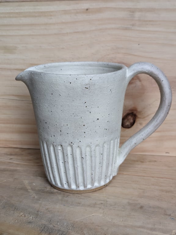 Larger matte cream carved jug (fully glazed)