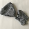 Hand knitted child's hat and mittens