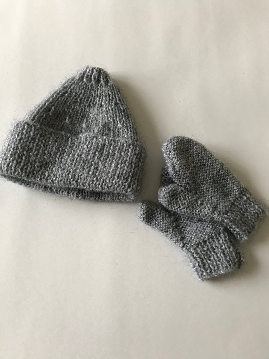 Hand knitted child's hat and mittens