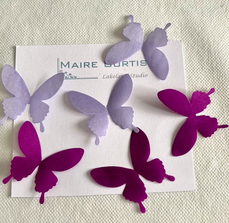 Silk satin swallowtail butterflies in shades of Violet