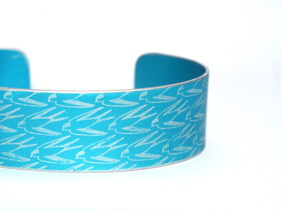 Geometric swallow pattern cuff bracelet turquoise