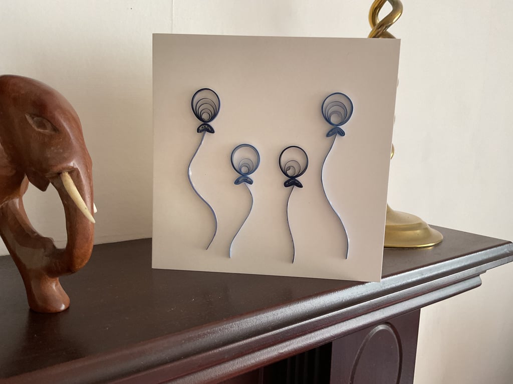 Four Quilled Balloons on a Ivory Greetings Card