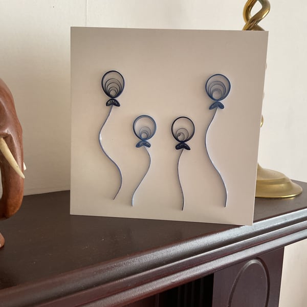 Four Quilled Balloons on a Ivory Greetings Card