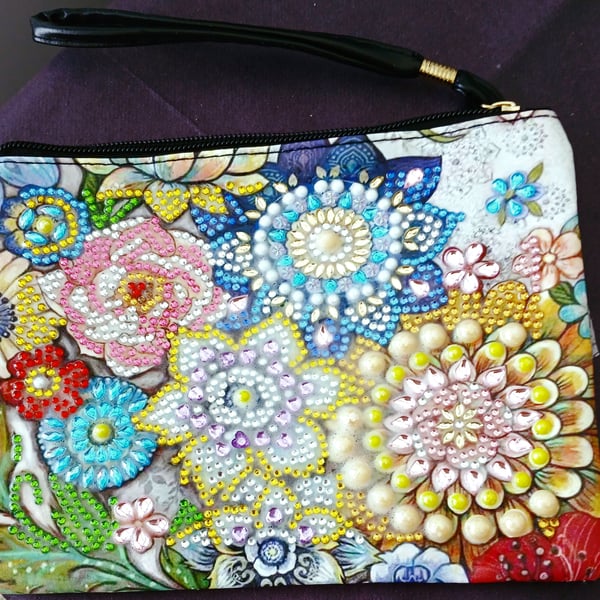 Women's faux leather mini bag with handle and zipper.  